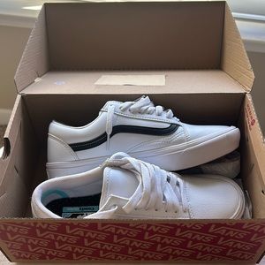 Barely worn white and black leather vans